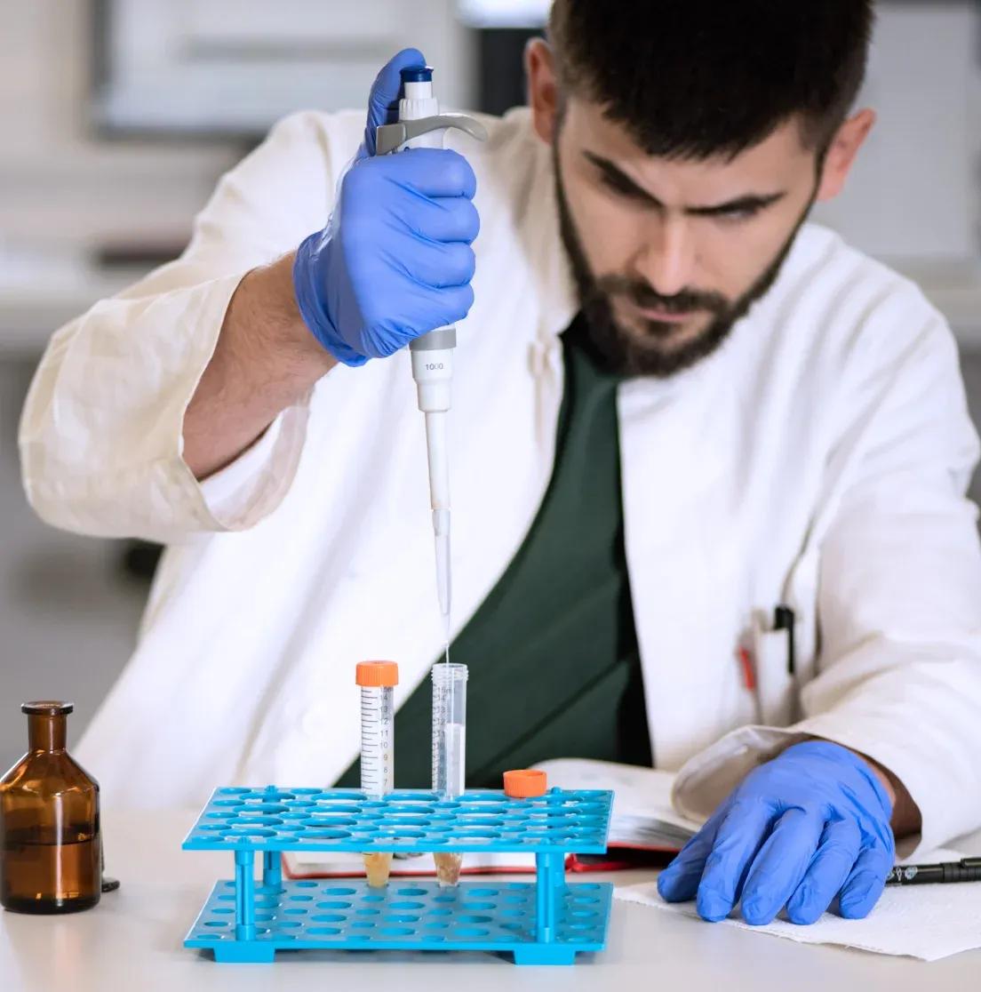 Sample Control employee taking samples in laboratory